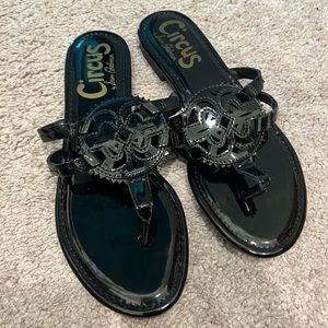 Black patent flip flops